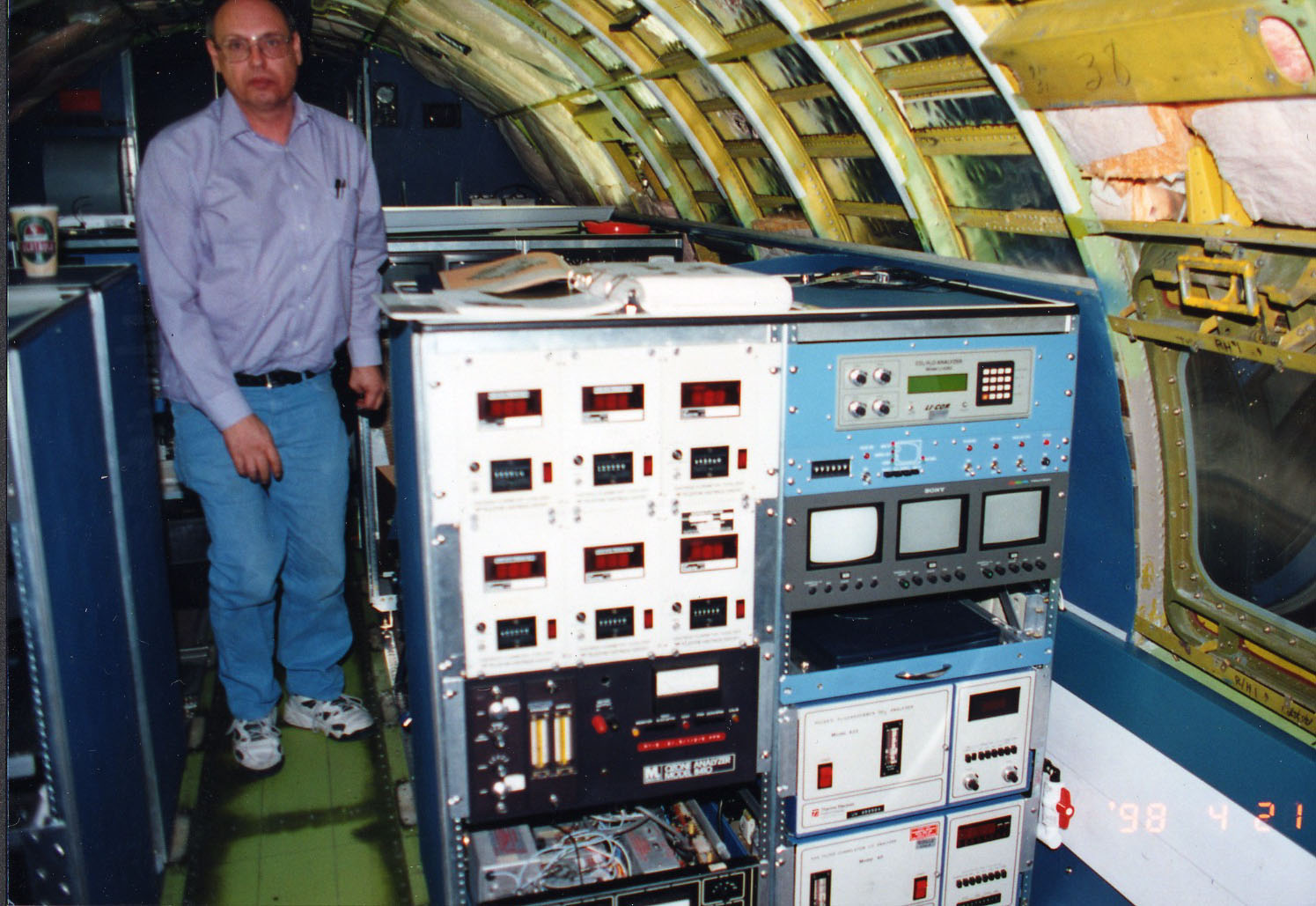 Jack contemplating work on the chem station (foreground, right).jpg