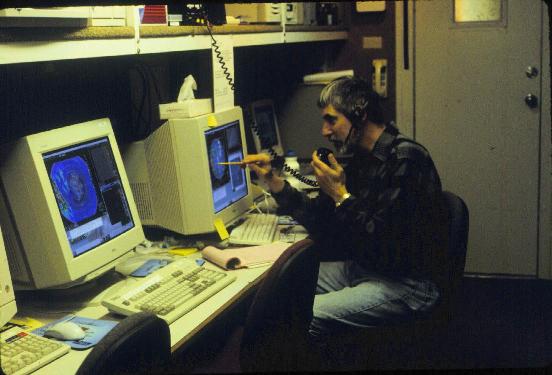 John Locatelli (UW) talking to the Convair-580 via radio in the S-Pol science trailer..jpg