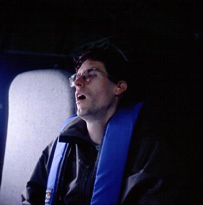 Stan Rose (UW) monitoring the weather onboard the Convair-580.jpg